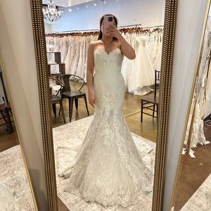 Ivory size 10 with a very detailed train